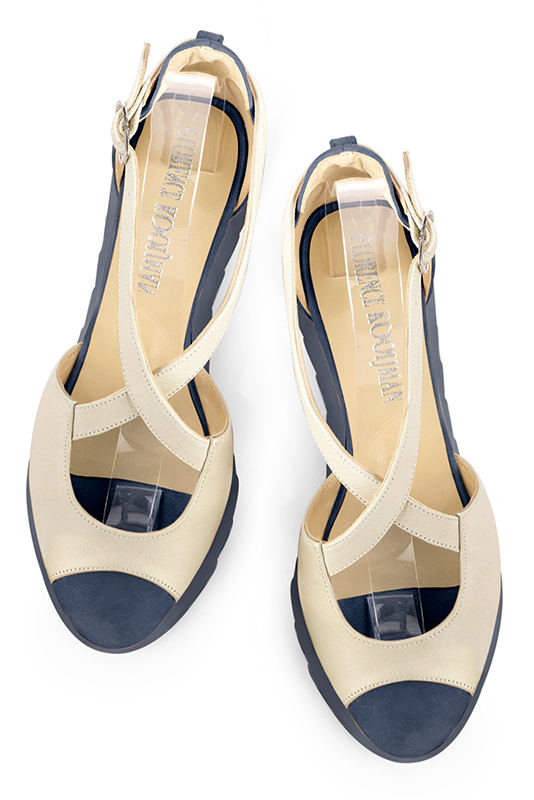 Off white and denim blue women's closed back sandals, with crossed straps. Round toe. Low rubber soles. Top view - Florence KOOIJMAN